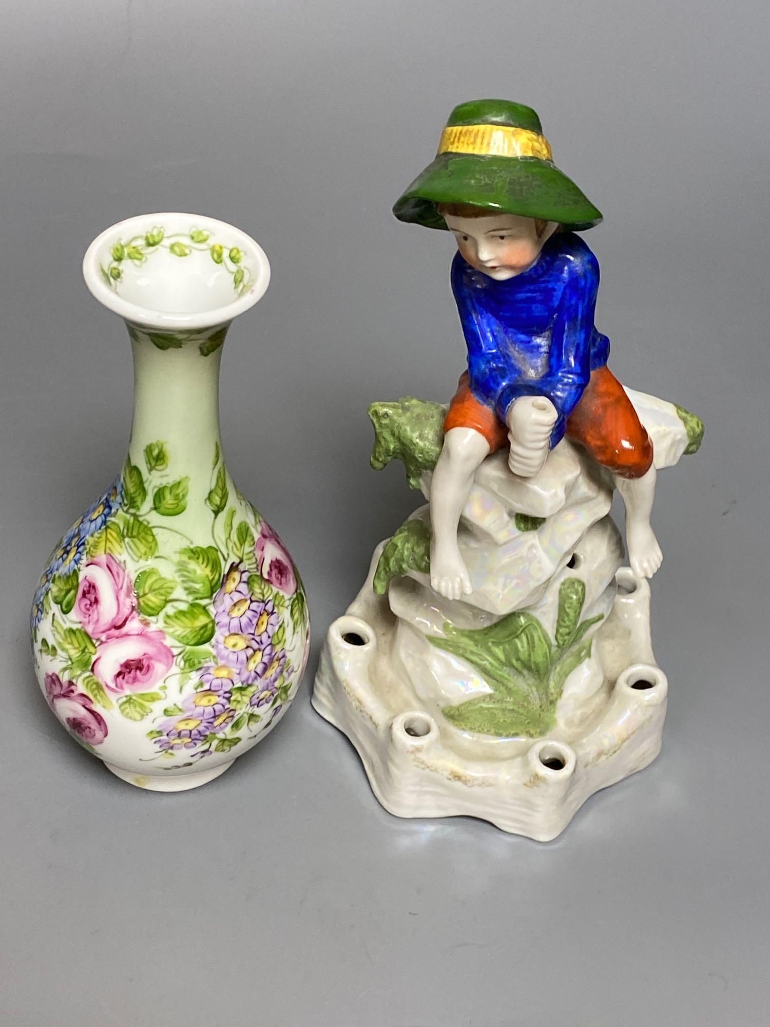 A Sitzendorf figure Fisher boy, a Coalport cottage and Continental ceramics (6)